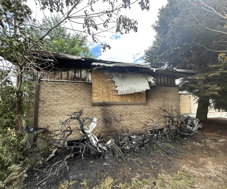Best Option Restoration Lakewood - Fire Damage Exterior Fire-damaged brick building with charred debris outside